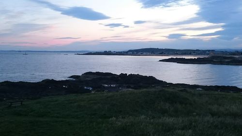 Scenic view of sea against sky during sunset