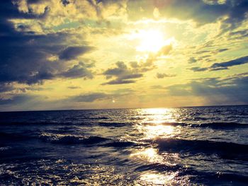 Scenic view of sea at sunset