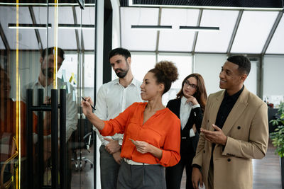 Business colleagues working in office