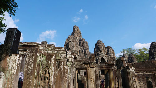 Low angle view of old temple against sky