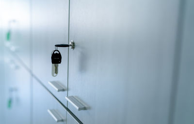 Locker with key in office room. filing cabinet lock with key for safety and security system.