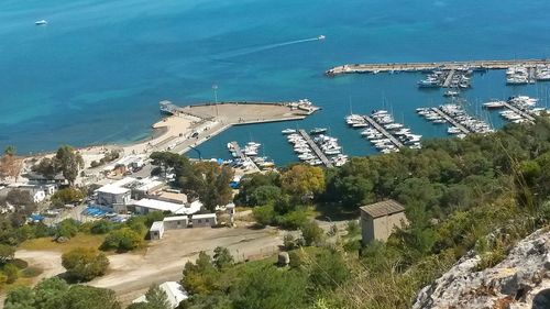 High angle view of city by sea