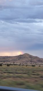 Scenic view of landscape against sky during sunset