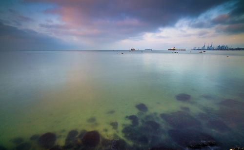 Scenic view of calm sea against sky