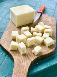 High angle view of chopped bread on cutting board