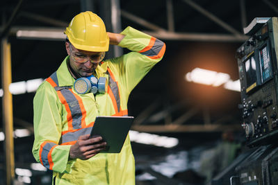 Man working on mobile phone