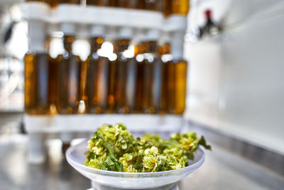 Close-up of vegetables in glass on table