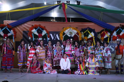 Group of people in market stall