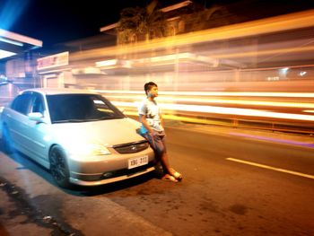 Full length of a car on road at night