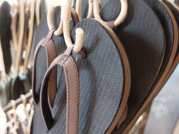 Close-up of clothes hanging on display at store