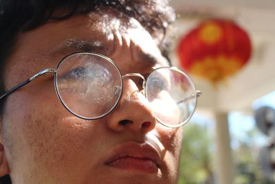 Close-up portrait of man with eyeglasses