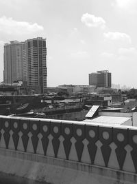 Modern buildings in city against sky