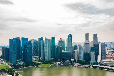 Modern buildings in city against sky