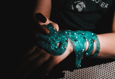 High angle view of people holding hands