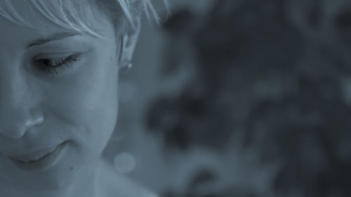 Close-up of woman looking away