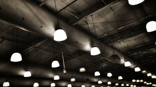 Low angle view of illuminated ceiling