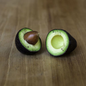 Close-up of green fruits on table