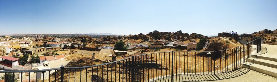 High angle view of town against clear sky