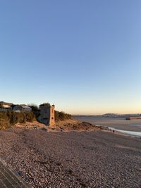 Scenic view of sea against clear blue sky