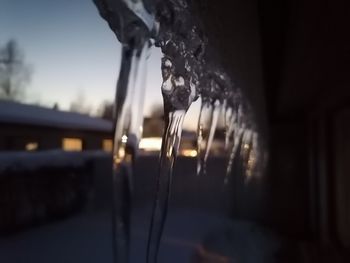 Close-up of water drops on metal