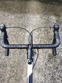 High angle view of bicycle on road in city