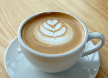 High angle view of cappuccino on table