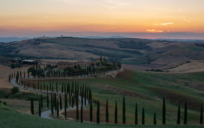 Scenic view of landscape against sky during sunset