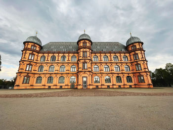 View of historical building against cloudy sky