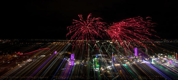 Firework display at night