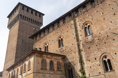 Low angle view of old building against sky