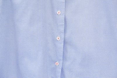 Full frame shot of shirt buttons