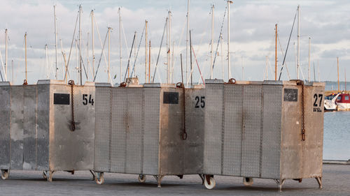 Abandoned baggage containers at harbor