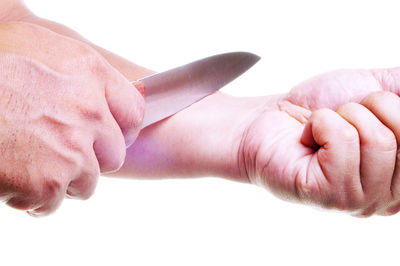 Cropped image of woman with hands on white background