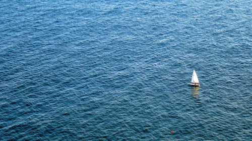 High angle view of sailboat in sea