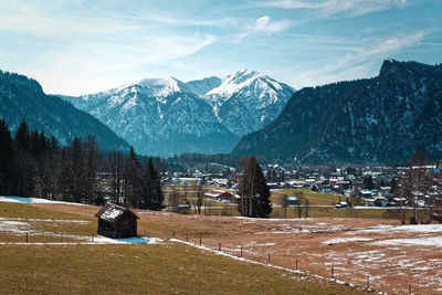 Scenic view of snowcapped mountains against sky