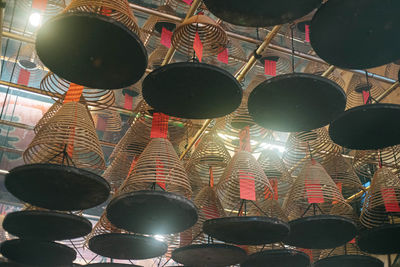 Low angle view of illuminated lanterns hanging at market