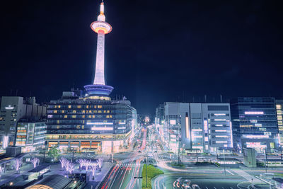 Illuminated buildings in city at night