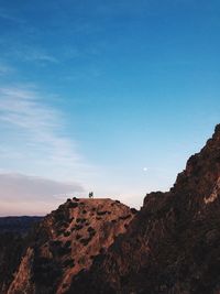 Scenic view of landscape against blue sky