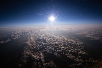 Aerial view of sunlight against sky