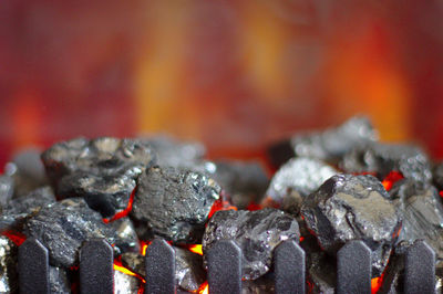 Glowing charcoal in fire place