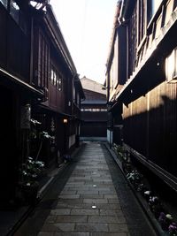 Walkway amidst buildings