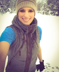 Portrait of a smiling young woman in winter