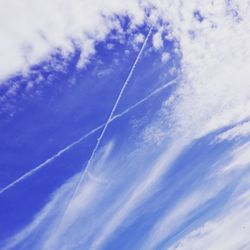 Low angle view of vapor trail in sky