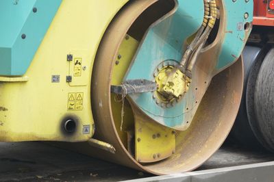 Close-up of yellow vintage car on street