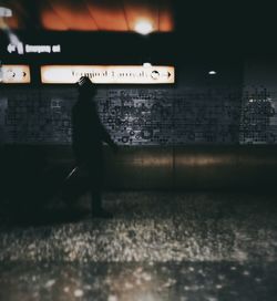 Railroad station platform at night