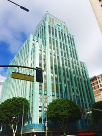 Low angle view of modern buildings against sky