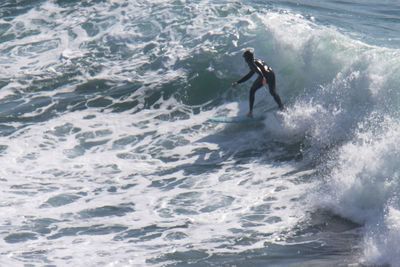 Man surfing in sea