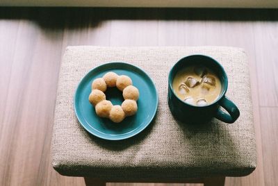 High angle view of coffee served on table