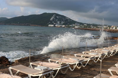 Scenic view of sea waves against sky