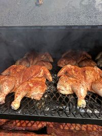 Close-up of meat on barbecue grill